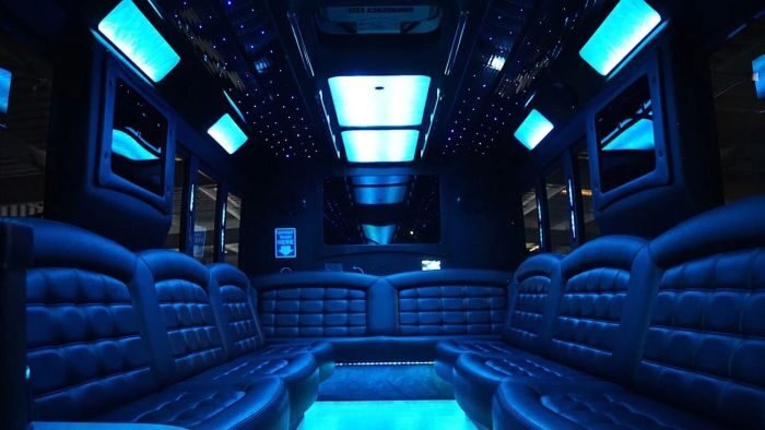 Wraparound seating and blue LED lights – Loveland party bus rental