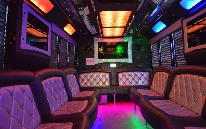 Party bus lounge with LED ceiling – Loveland party bus rental