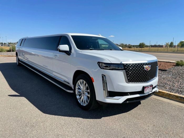 White Escalade stretch limo – Loveland party bus rental