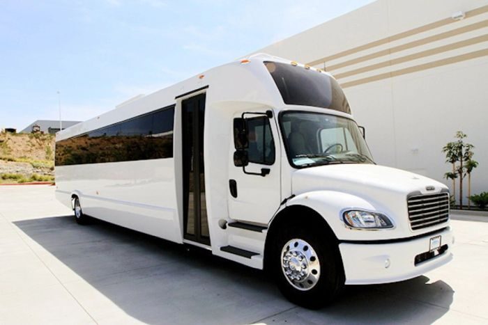 White limo bus – Loveland party bus rental